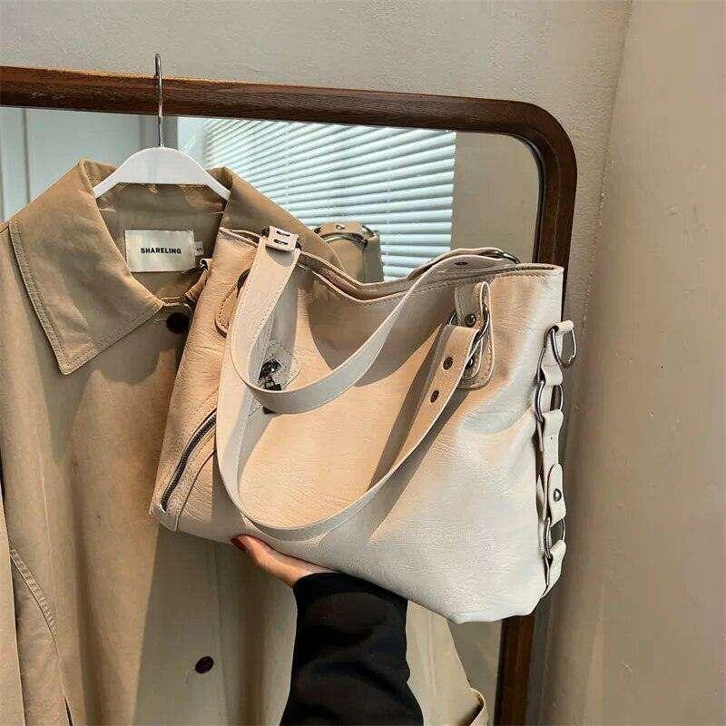 תיק עור שחור לנשים | עיצוב אלגנטי ורב שימושי – צ'יק אווניו