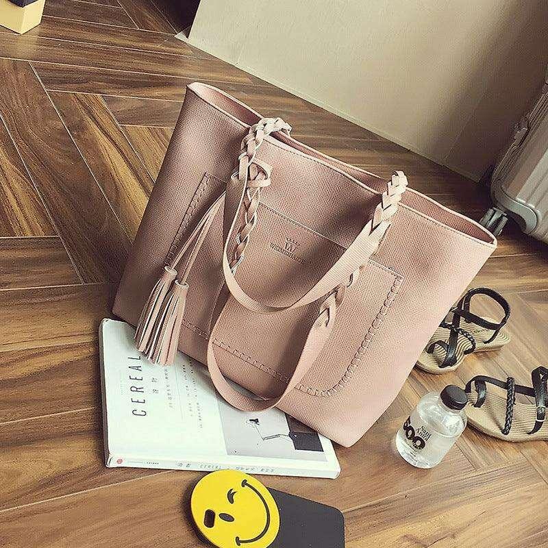 Fashionable tote bag with braided and tassel decoration