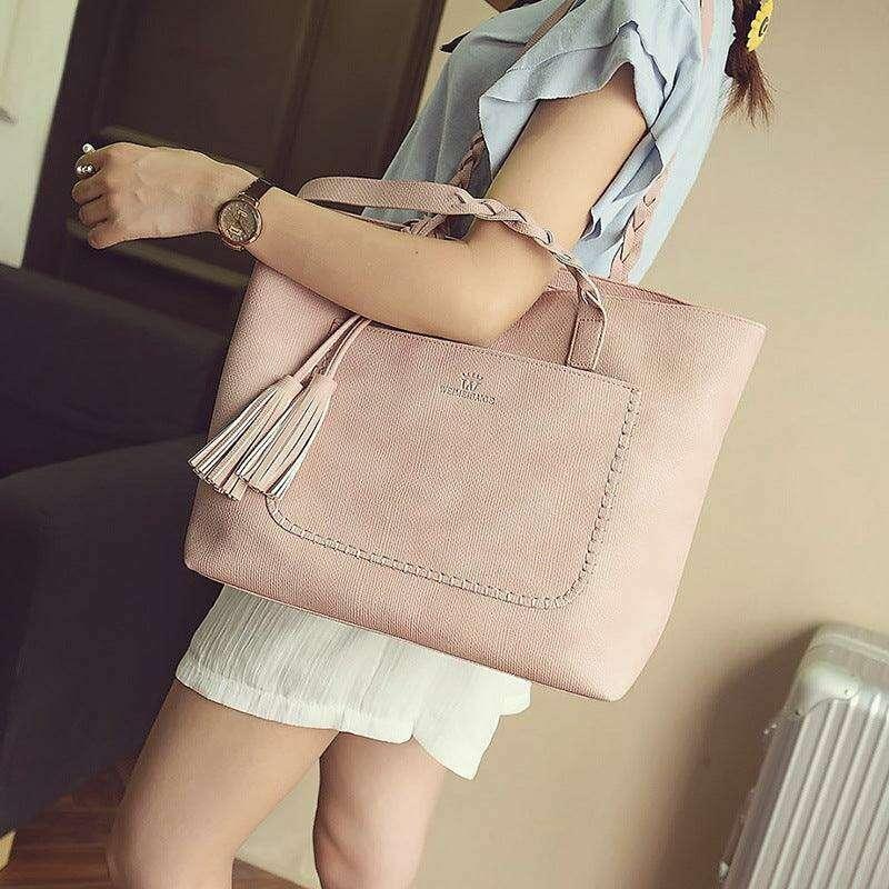 Fashionable tote bag with braided and tassel decoration