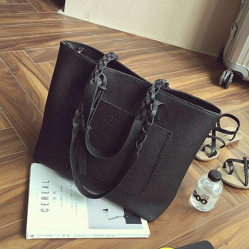 Fashionable tote bag with braided and tassel decoration