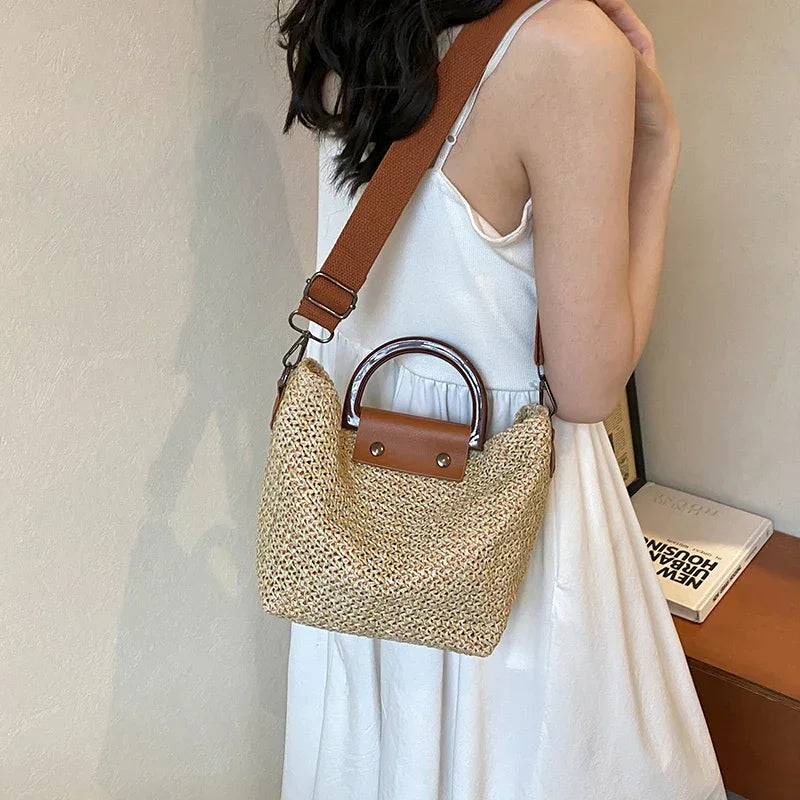 Large woven bag for women with round handle and padded shoulder strap