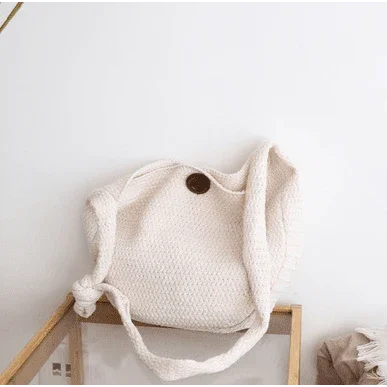Knitted shoulder bag for women in a natural design