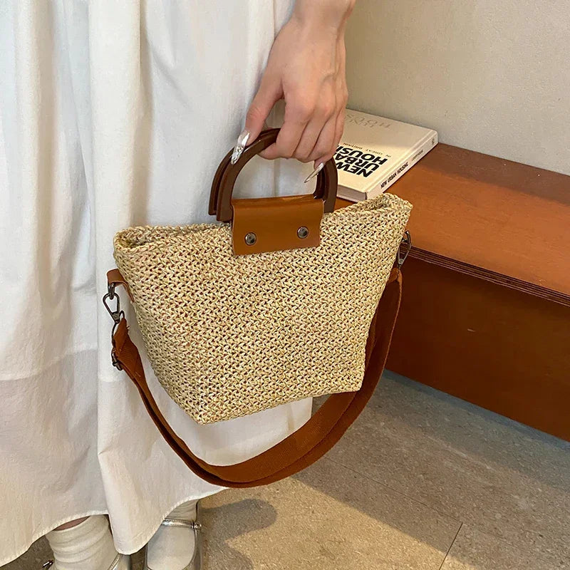Large woven bag for women with round handle and padded shoulder strap