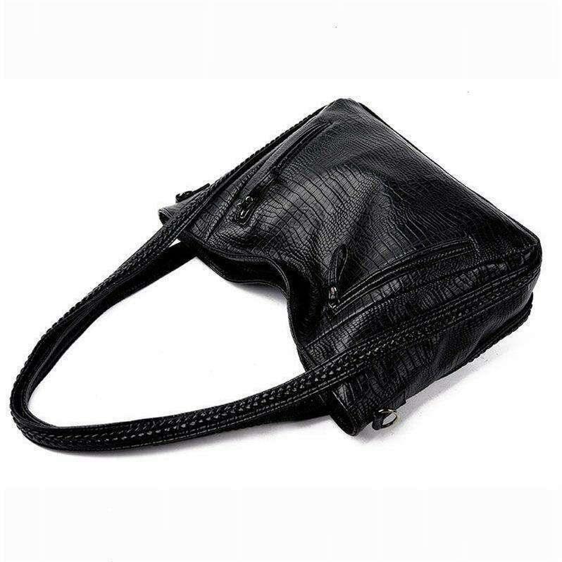 Women's side bag in black crocodile leather look