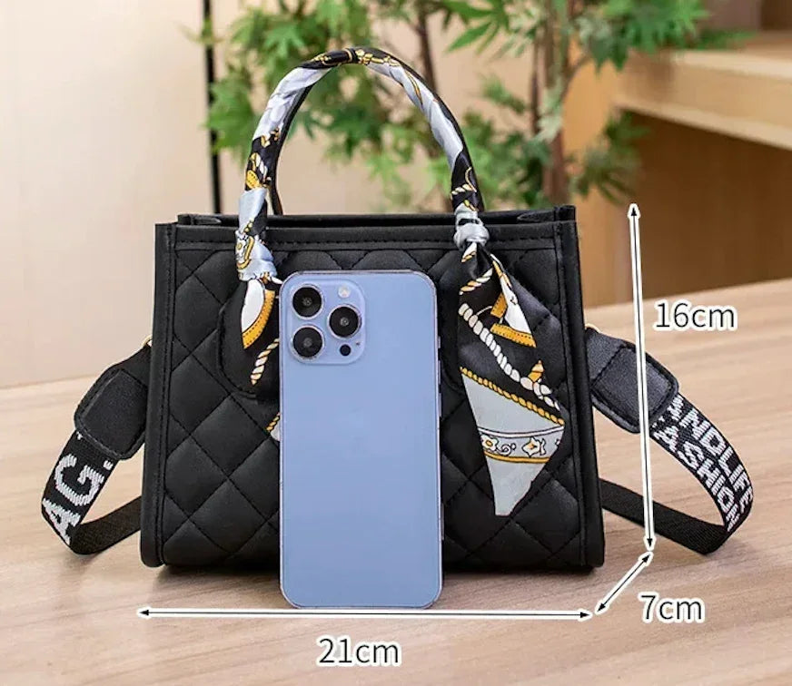 Stylish quilted bag with designed scarf handles