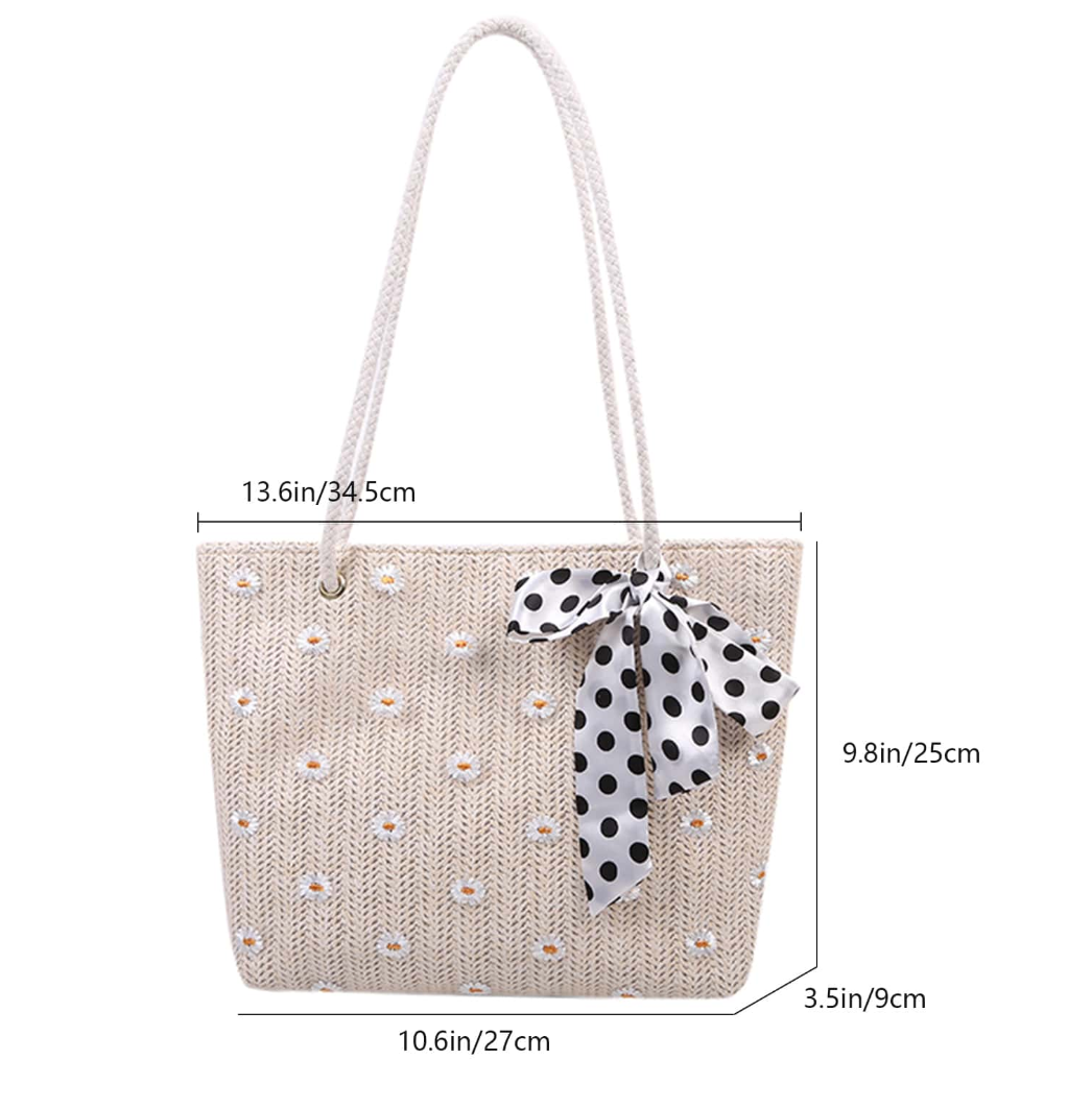 Feminine straw bag with floral decorations and polka dot silk ribbon