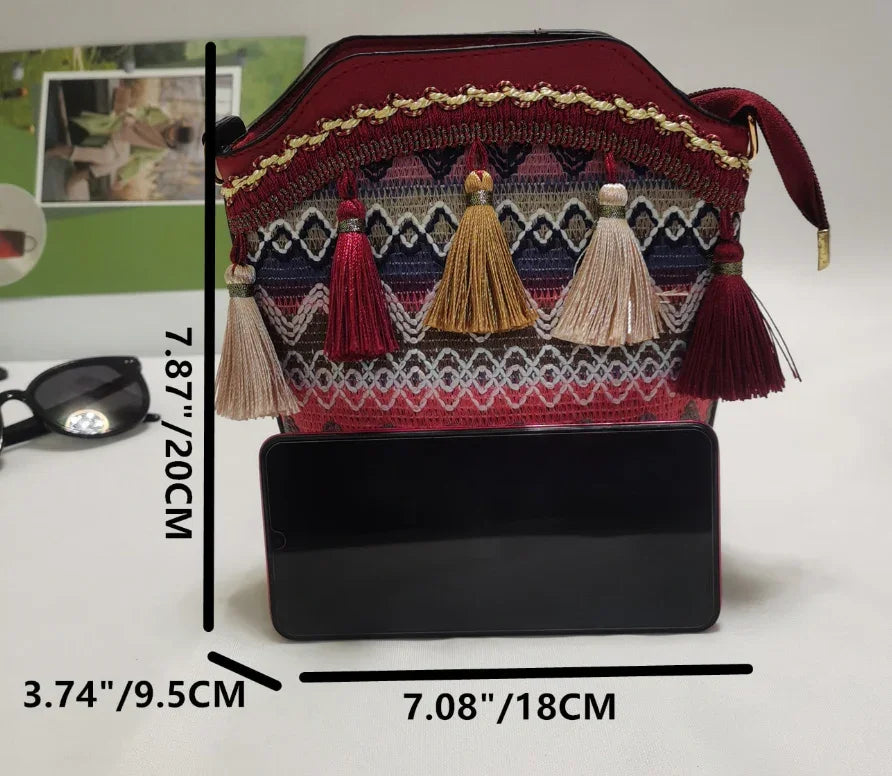 Bohemian style shoulder bag with fringe decorations