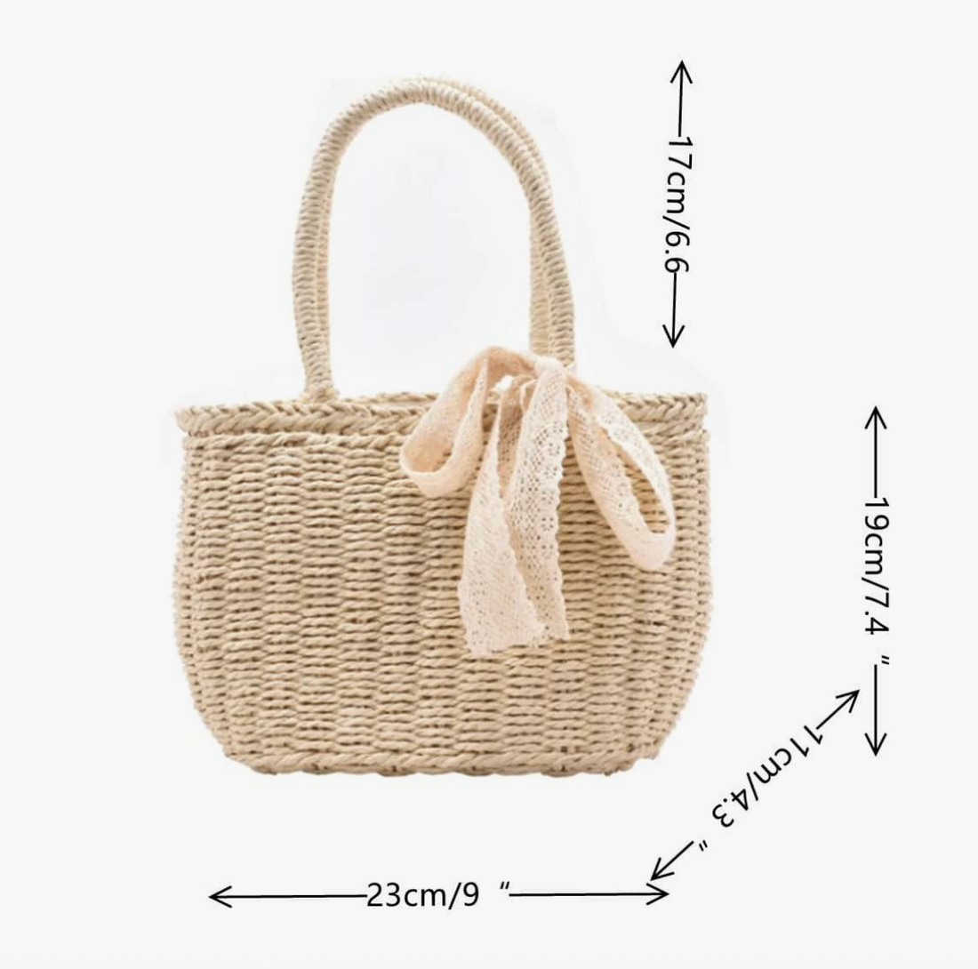 Elegant straw bag with floral bow