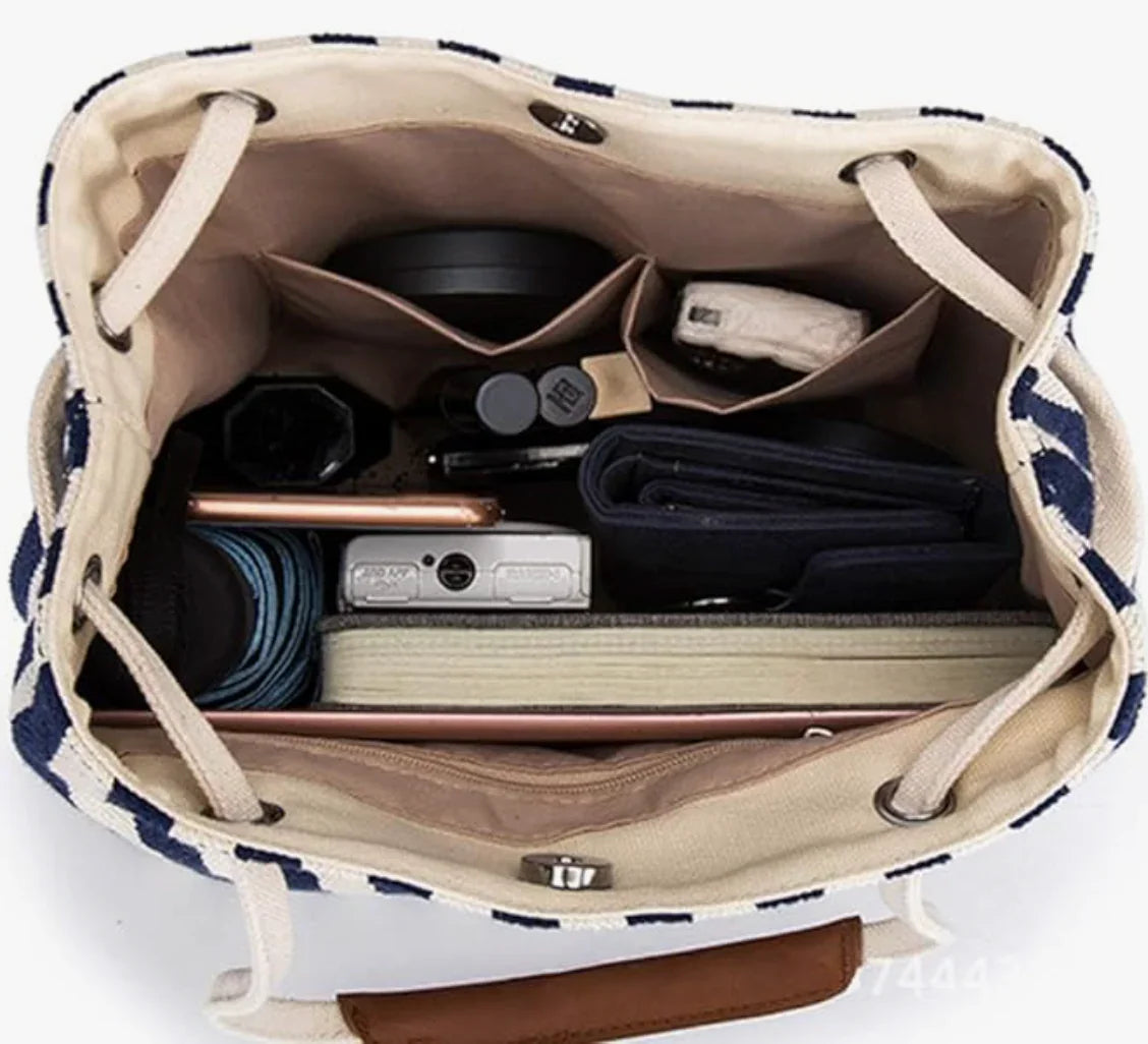 Nautical beach bag with round handle and flat shoulder strap