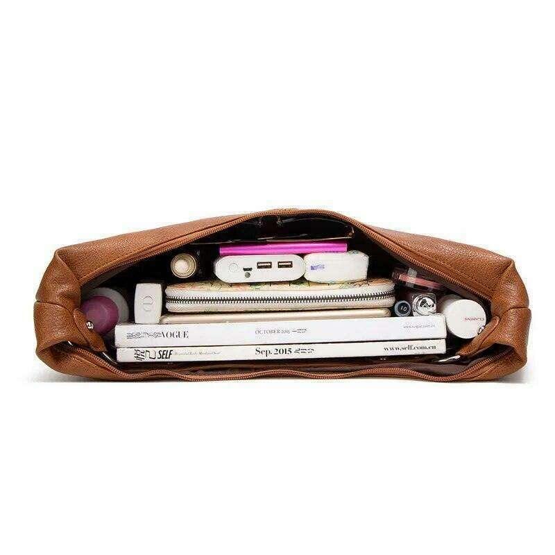 תיק כתף רחב מעור לנשים