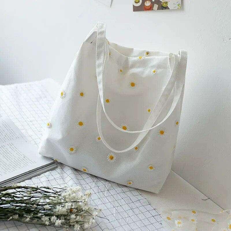 תיק בד עם הדפס פרחים – תיק קליל ופרחוני לשימוש יומיומי