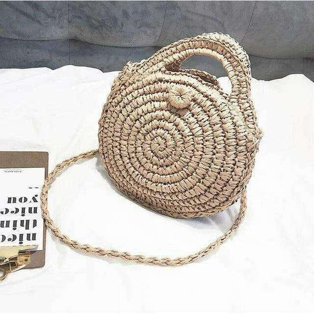 תיק צד עגול בעבודת יד - עיצוב טבעי ואותנטי