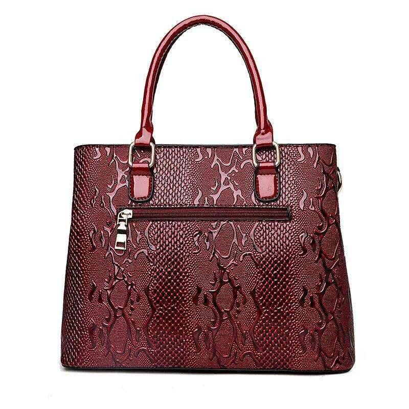 Luxurious leather bag for women in a snake print design