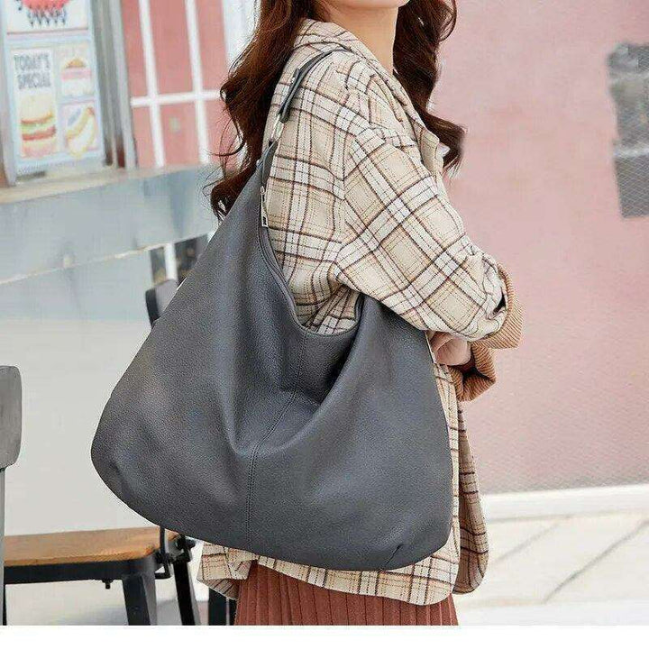 Women's wide leather shoulder bag