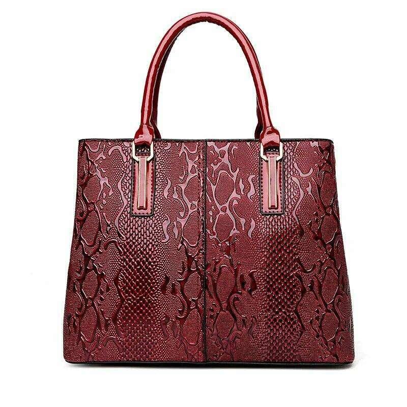 Luxurious leather bag for women in a snake print design