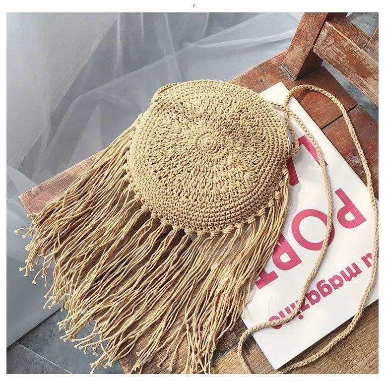 תיק מקרמה עגול עם פרנזים