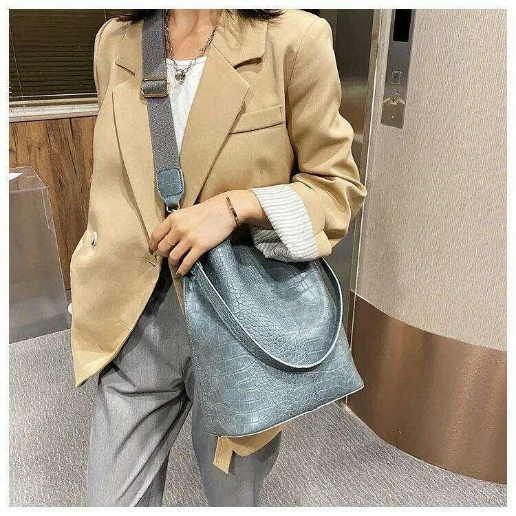 A fashionable shoulder bag with a unique look and crocodile texture