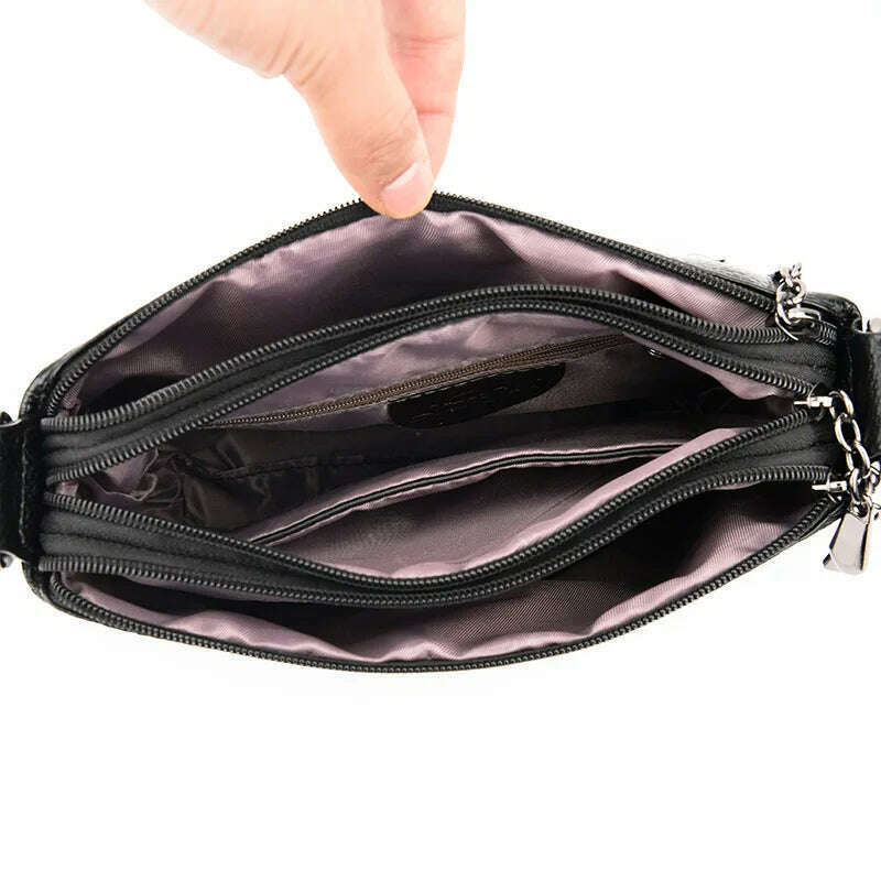 תיק צד מעור דמוי נחש לנשים