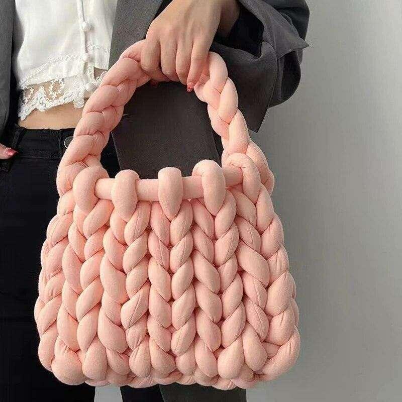 Knitted bag with braided design