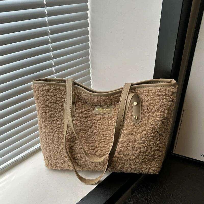 Women's brass shoulder bag - warmth and style for the winter season