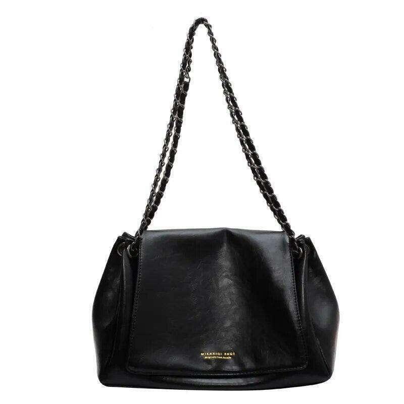 Women's crossbody bag with a designed chain strap