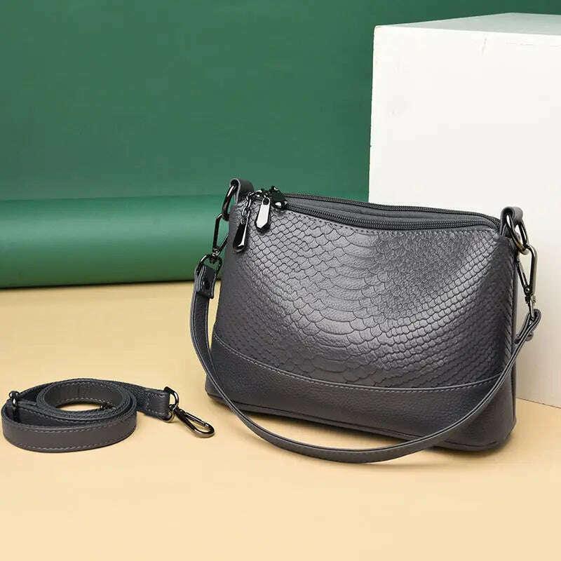 Women's snake-like leather crossbody bag