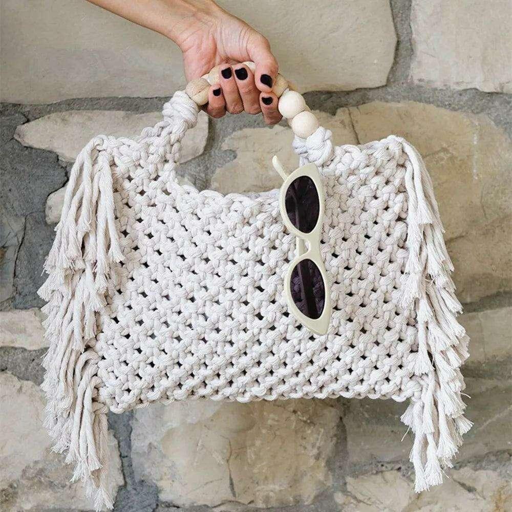 Knitted bag with wooden handles and bohemian touches