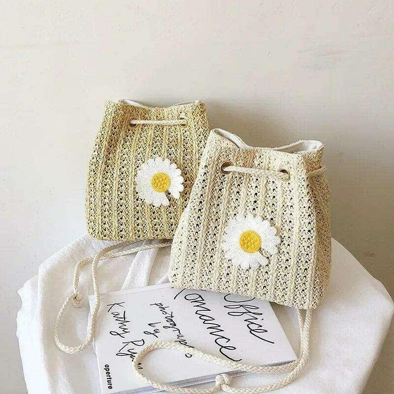 Women's knitted sack bag with floral decoration