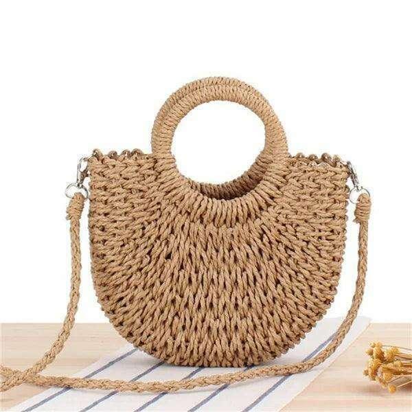Round straw bag with a classic and feminine design