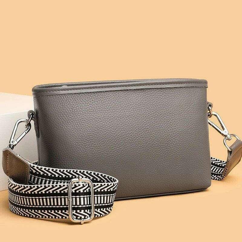 Small leather crossbody bag for women with a designed strap