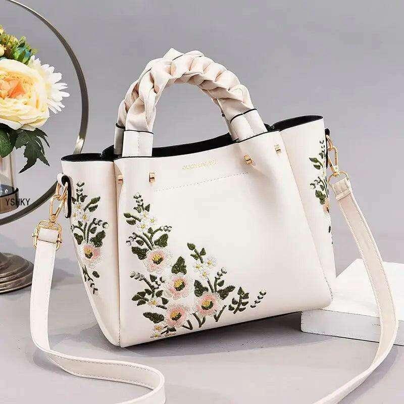 Embroidered handbag with floral pattern