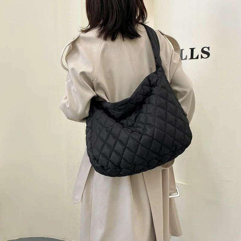 Modern style padded women's bag