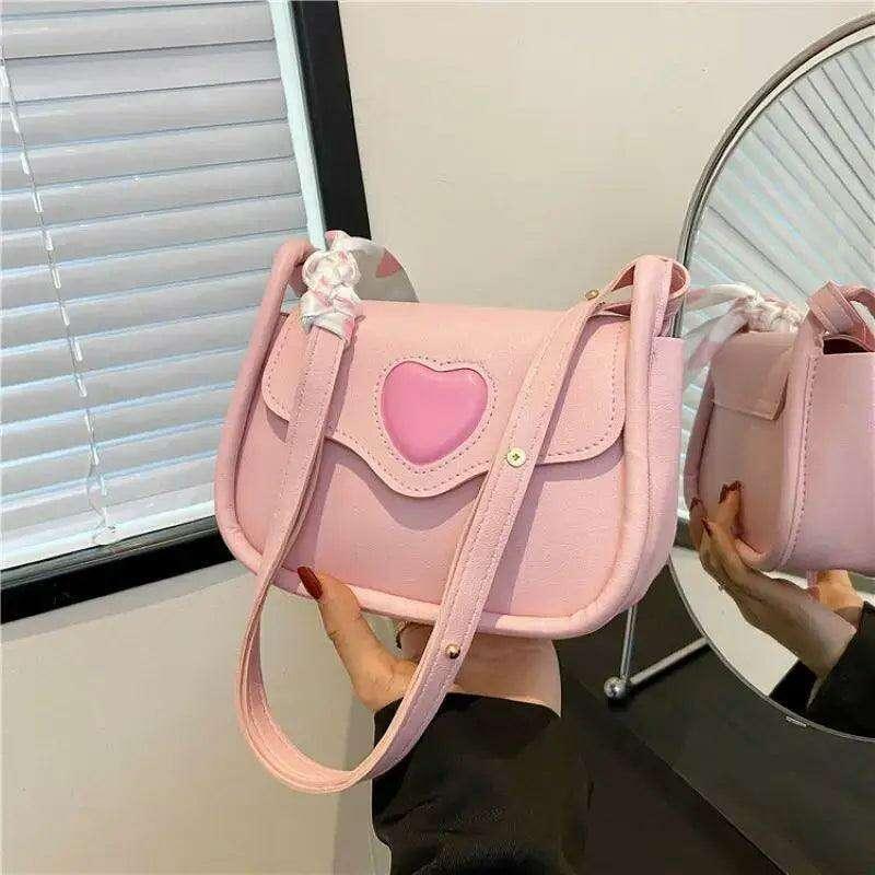 Women's shoulder bag with a romantic heart design