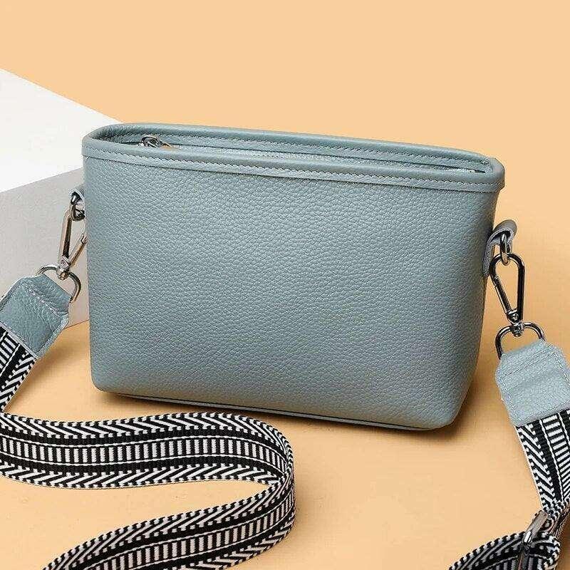 Small leather crossbody bag for women with a designed strap