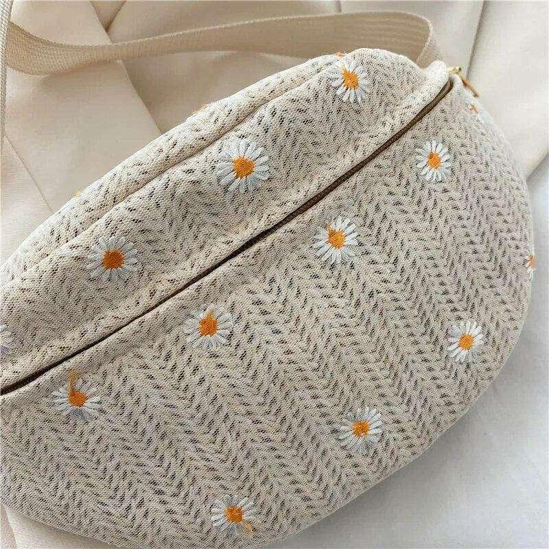 Knitted pouch bag with floral embroidery