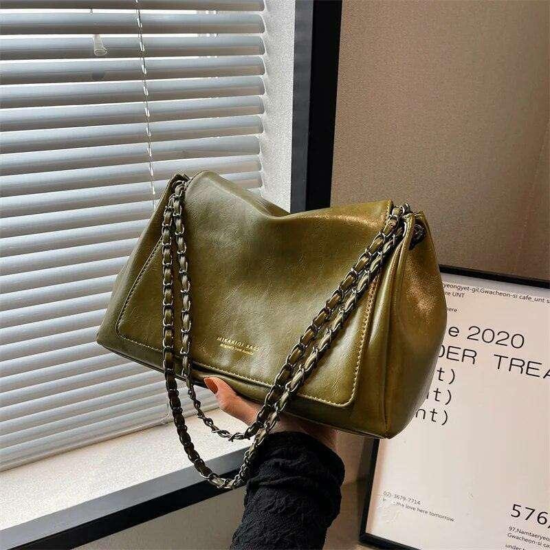 Women's crossbody bag with a designed chain strap