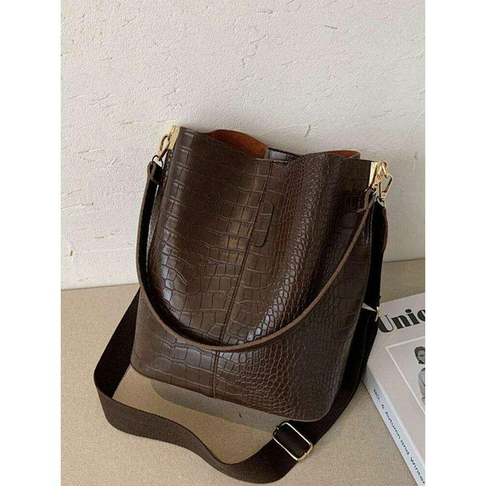 A fashionable shoulder bag with a unique look and crocodile texture