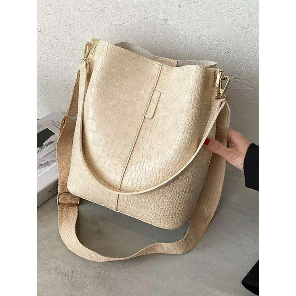 A fashionable shoulder bag with a unique look and crocodile texture