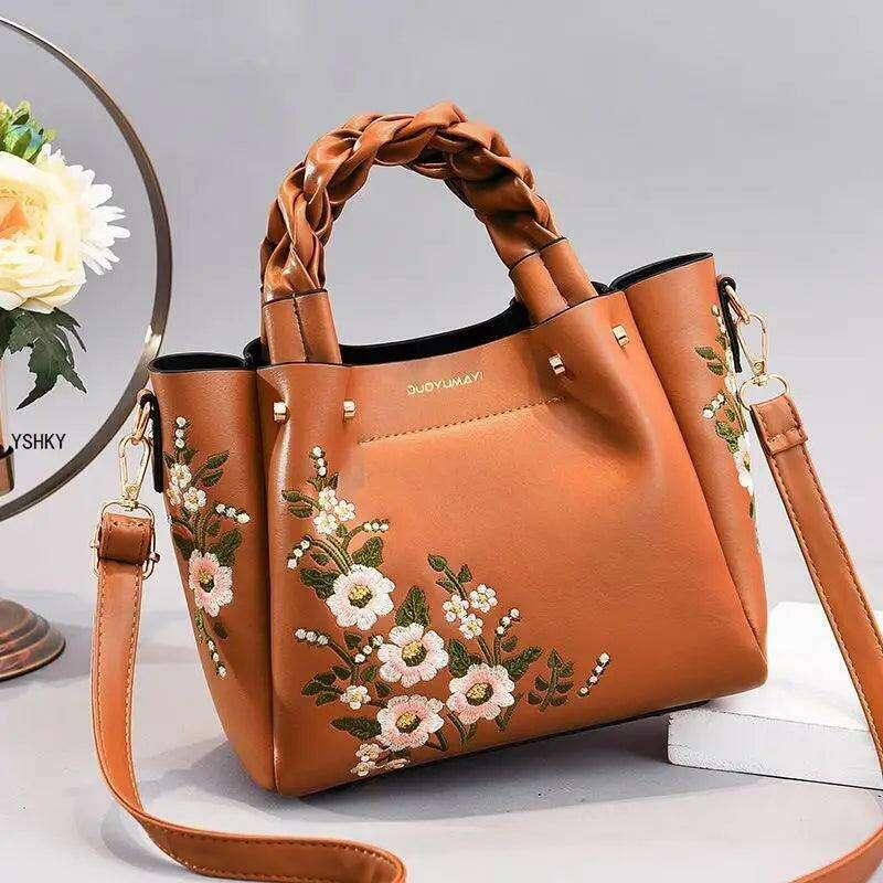 Embroidered handbag with floral pattern
