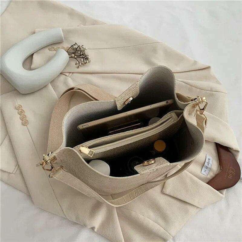 A fashionable shoulder bag with a unique look and crocodile texture