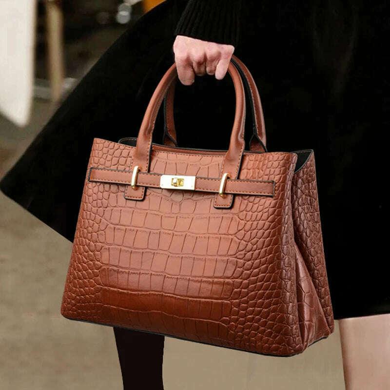 Elegant brown crocodile leather handbag - luxury and comfort for women