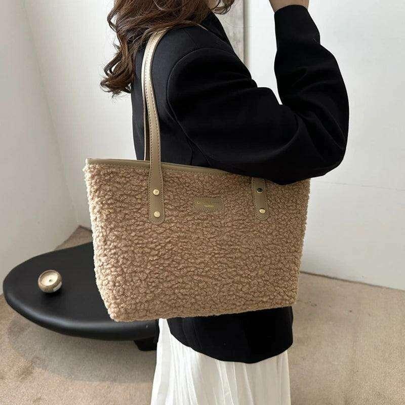 Women's brass shoulder bag - warmth and style for the winter season