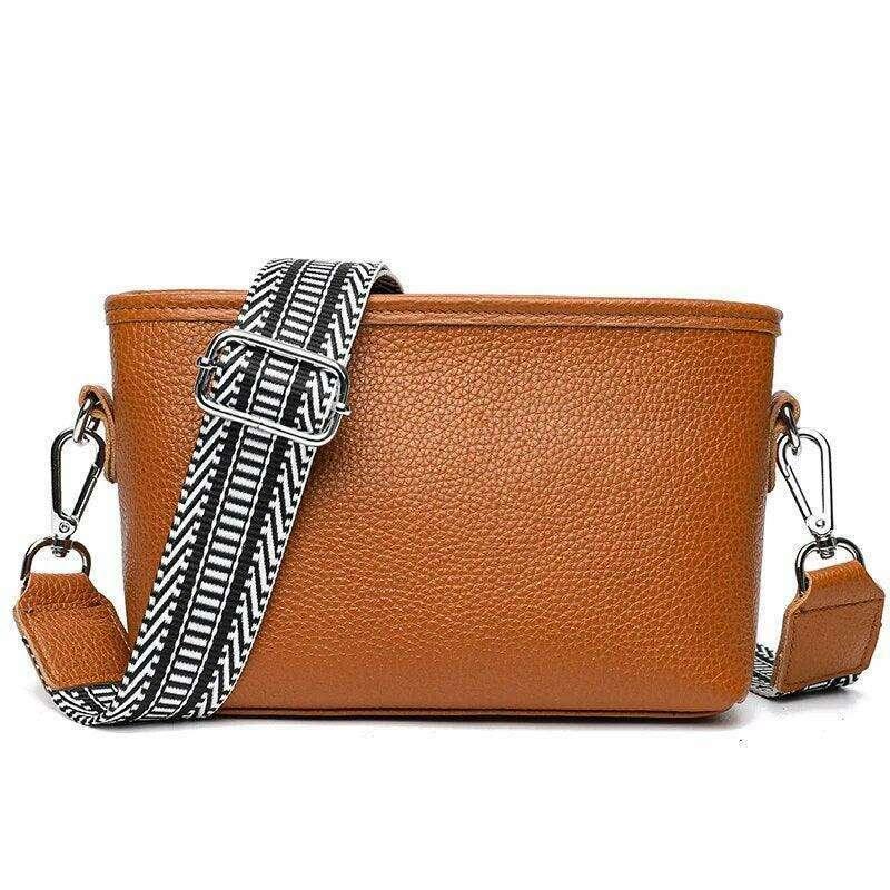 Small leather crossbody bag for women with a designed strap