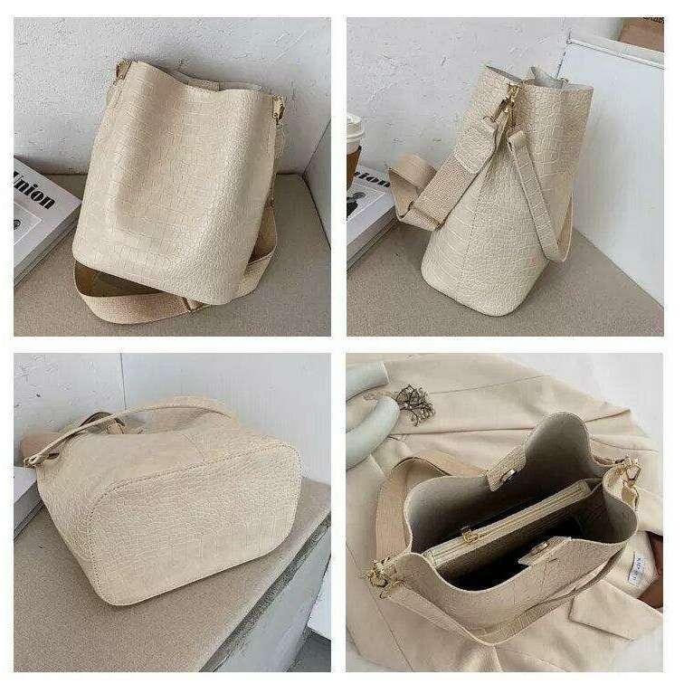 A fashionable shoulder bag with a unique look and crocodile texture