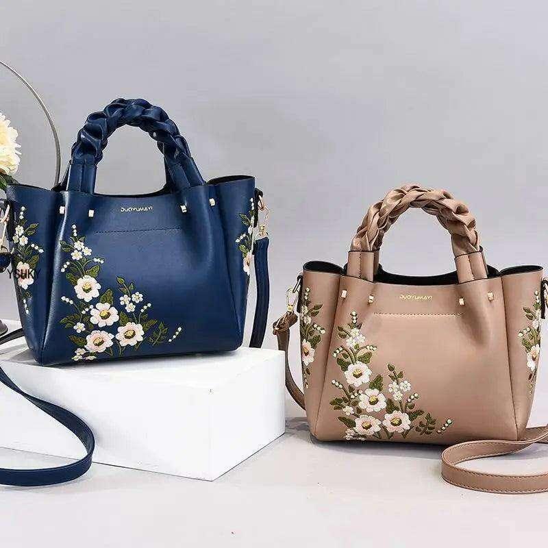 Embroidered handbag with floral pattern