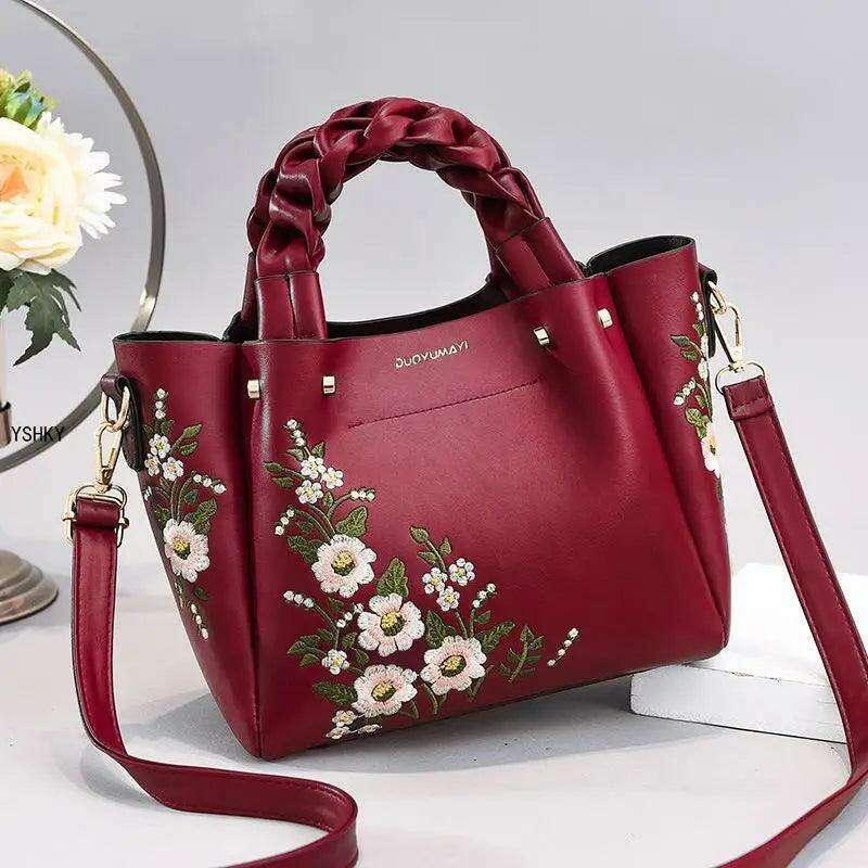 Embroidered handbag with floral pattern
