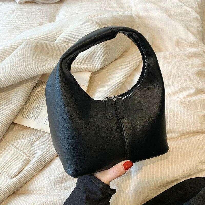 A women's handbag with a unique and elegant design