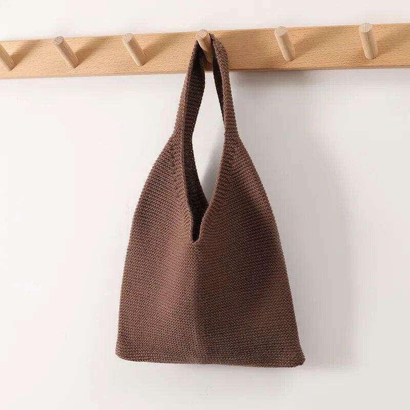 Knitted shoulder bag for women - classic and modern design