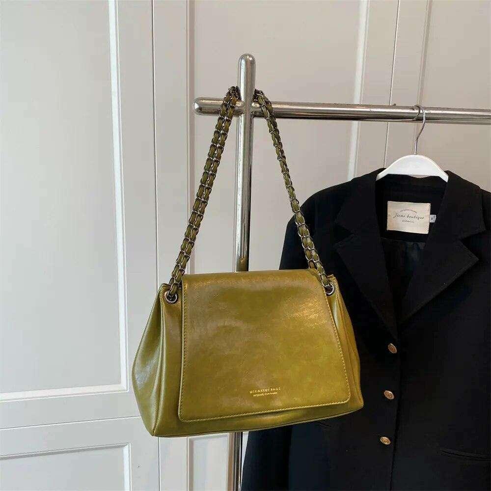 Women's crossbody bag with a designed chain strap