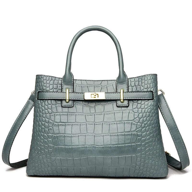 Elegant brown crocodile leather handbag - luxury and comfort for women